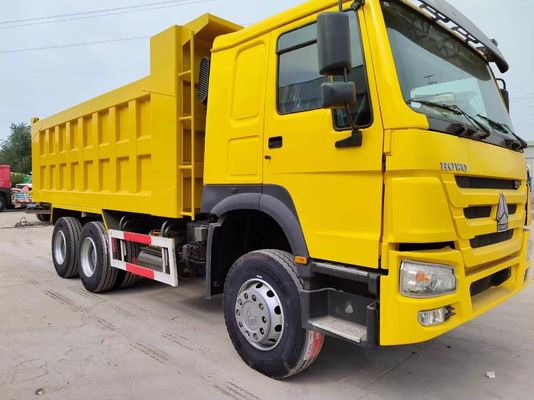 Тип ручной трансмиссии Sinotruk HOWO Дампер-грузовик 10 колес Желтый цвет Накидывающий грузовик