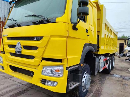 Тип ручной трансмиссии Sinotruk HOWO Дампер-грузовик 10 колес Желтый цвет Накидывающий грузовик